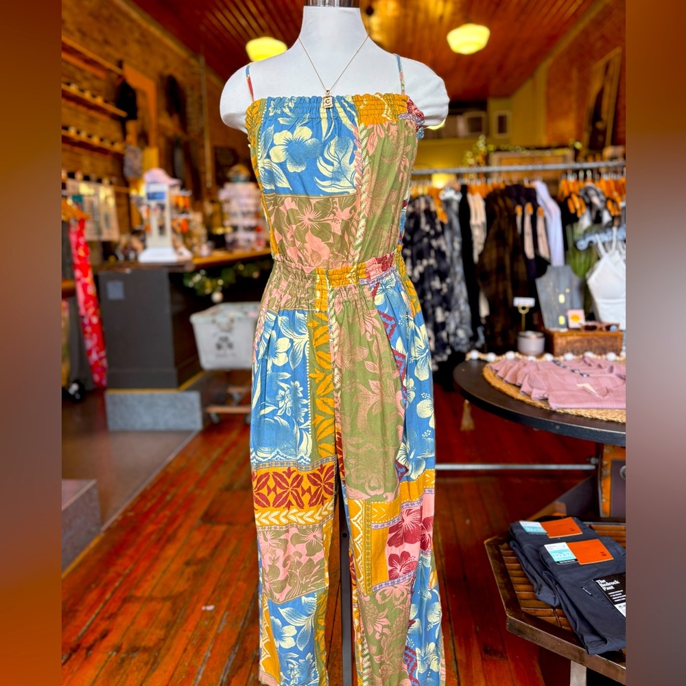 Free People Retro Heat Wave Romper: playful, and perfect for any adventure!